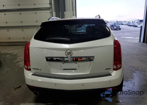 2015 Cadillac Srx Luxury Collection z USA, uszkodzony, nr VIN 3GYFNEE36FS574013